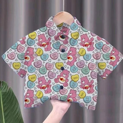 เสื้อเชิ้ตเด็กลายการ์ตูนสุดฮิต ชายหญิงใส่ได้ สีสันสดใส ลายคมชัด ผ้าโพลีเอสเตอร์ใส่สบาย